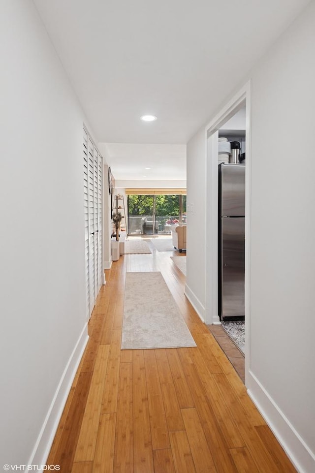 7200 N Ridge Blvd Unit 2C, Chicago, IL 60645 - hall with light wood finished floors and recessed lighting