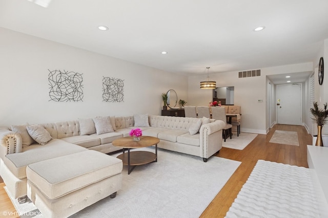 7200 N Ridge Blvd Unit 2C, Chicago, IL 60645 - living room featuring light wood-style flooring and recessed lighting