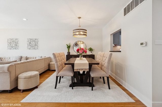 7200 N Ridge Blvd Unit 2C, Chicago, IL 60645 - dining space featuring a chandelier, light wood finished floors, and recessed lighting
