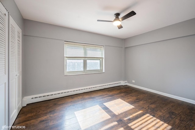 4960 N Marine Dr Unit 519, Chicago, IL 60640 - unfurnished bedroom with a baseboard heating unit, wood finished floors, and a ceiling fan