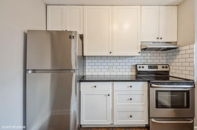 4960 N Marine Dr Unit 519, Chicago, IL 60640 - kitchen with stainless steel appliances, under cabinet range hood, white cabinetry, dark countertops, and tasteful backsplash