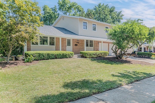 922 E Pratt Dr, Palatine, IL 60074 - view of front of property with brick siding, a front lawn, and a shingled roof