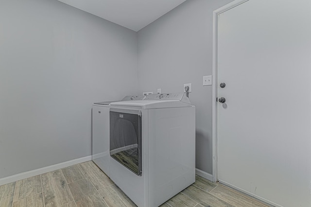922 E Pratt Dr, Palatine, IL 60074 - laundry room featuring washer and dryer and wood tiled floors