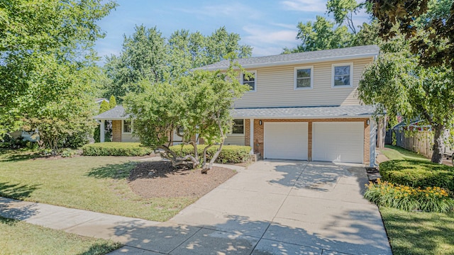 922 E Pratt Dr, Palatine, IL 60074 - view of front of property featuring concrete driveway, an attached garage, brick siding, and roof with shingles