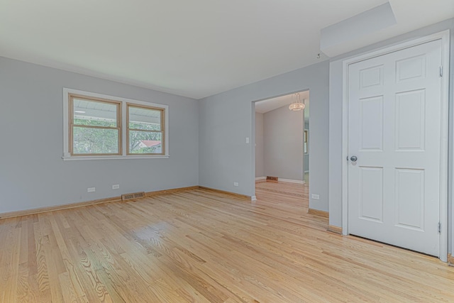 922 E Pratt Dr, Palatine, IL 60074 - unfurnished room with light wood-style floors
