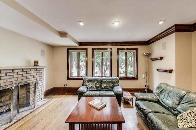 3215 S Calumet Ave, Chicago, IL 60616 - living area featuring healthy amount of natural light, a fireplace, wood finished floors, and recessed lighting