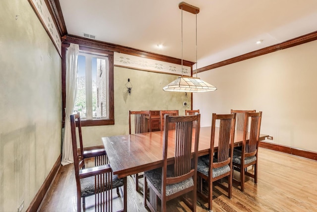 3215 S Calumet Ave, Chicago, IL 60616 - dining area with crown molding and wood finished floors
