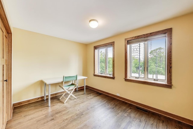 3215 S Calumet Ave, Chicago, IL 60616 - office area featuring wood finished floors and baseboards