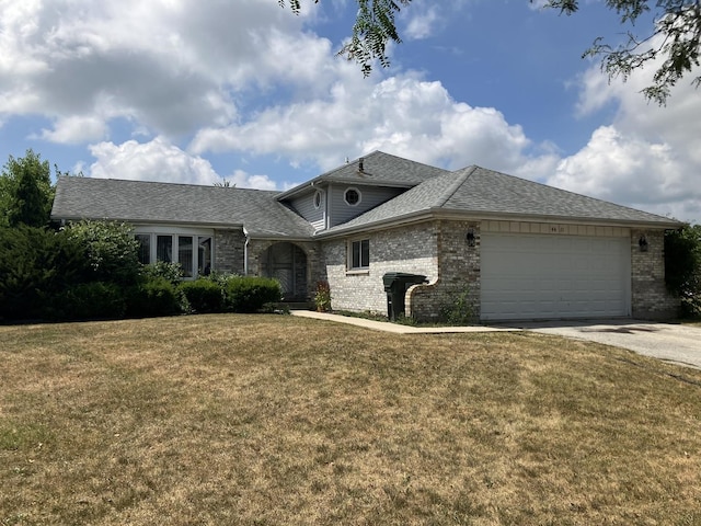 4411 Michael John Ct, Richton Park, IL 60471 - view of front of home with brick siding, concrete driveway, a garage, and a front lawn