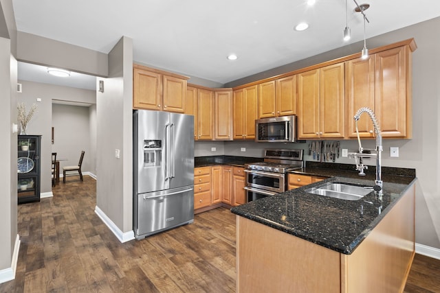 11248 Melrose Ct, Orland Park, IL 60467 - kitchen with stainless steel appliances, dark wood finished floors, a peninsula, dark stone countertops, and recessed lighting