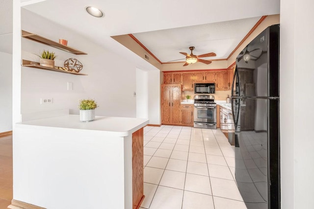 16719 Paxton Ave Unit 2S, Tinley Park, IL 60477 - kitchen featuring black appliances, a peninsula, light countertops, ceiling fan, and light tile patterned floors