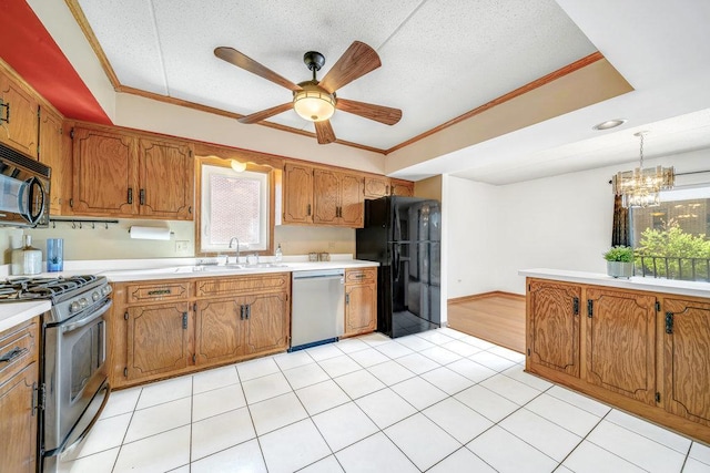 16719 Paxton Ave Unit 2S, Tinley Park, IL 60477 - kitchen with black appliances, a ceiling fan, brown cabinetry, ornamental molding, and a chandelier