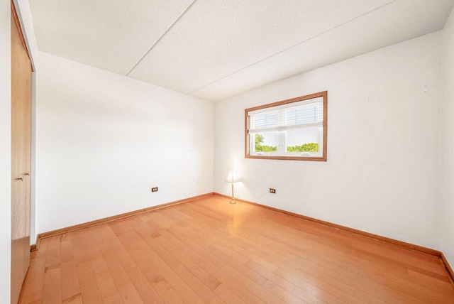16719 Paxton Ave Unit 2S, Tinley Park, IL 60477 - empty room featuring baseboards and wood finished floors