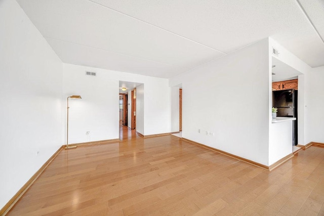 16719 Paxton Ave Unit 2S, Tinley Park, IL 60477 - unfurnished room featuring light wood finished floors and baseboards