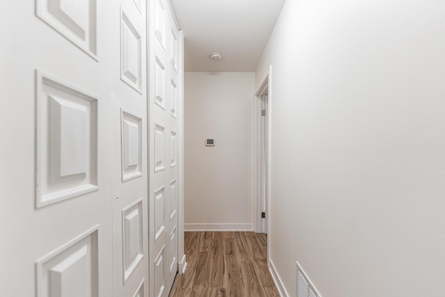 407 James Ct Unit D, Glendale Heights, IL 60139 - corridor with wood finished floors and baseboards