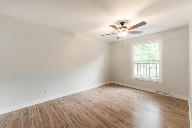 407 James Ct Unit D, Glendale Heights, IL 60139 - spare room with wood finished floors and ceiling fan