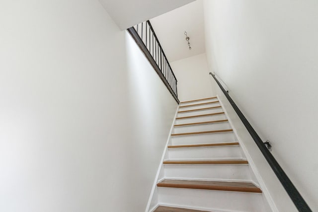 407 James Ct Unit D, Glendale Heights, IL 60139 - stairway featuring a high ceiling and wood finished floors