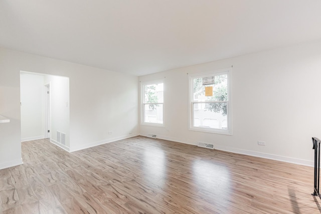 407 James Ct Unit D, Glendale Heights, IL 60139 - unfurnished room featuring light wood-style floors and baseboards