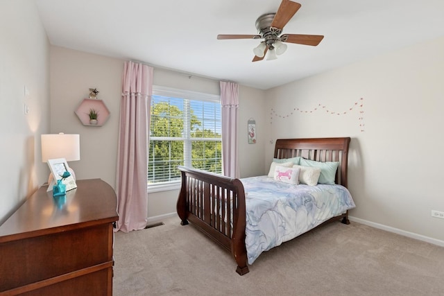 6072 Westminster Ln, Gurnee, IL 60031 - bedroom with light carpet and a ceiling fan