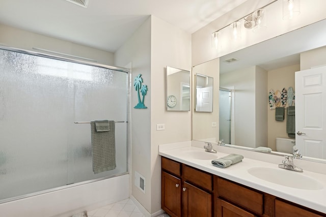 6072 Westminster Ln, Gurnee, IL 60031 - full bathroom with combined bath / shower with glass door, double vanity, and tile patterned flooring