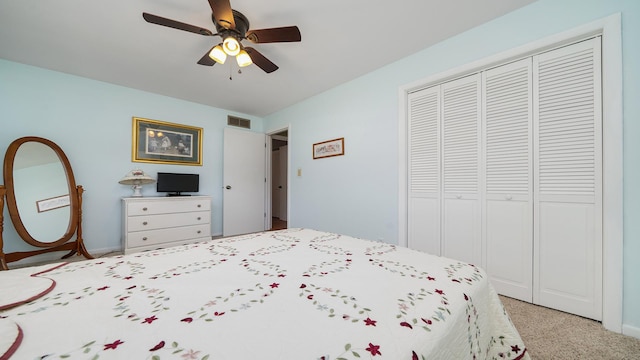 9833 Gentian Dr, Machesney Park, IL 61115 - bedroom featuring a closet, a ceiling fan, and light colored carpet