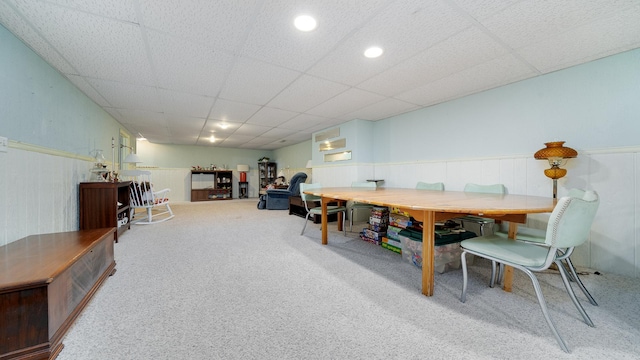 9833 Gentian Dr, Machesney Park, IL 61115 - dining room featuring wainscoting, carpet, and a drop ceiling