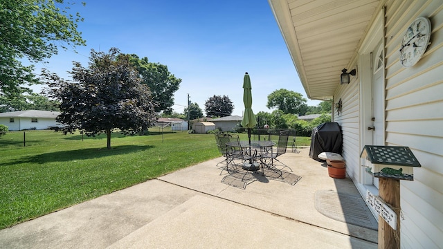 9833 Gentian Dr, Machesney Park, IL 61115 - view of patio with outdoor dining space and area for grilling