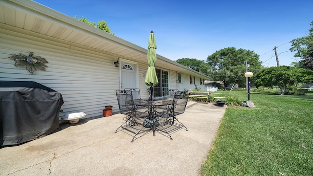 9833 Gentian Dr, Machesney Park, IL 61115 - view of patio / terrace featuring grilling area and outdoor dining area