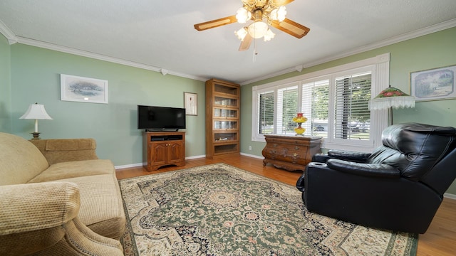 9833 Gentian Dr, Machesney Park, IL 61115 - living room featuring crown molding, wood finished floors, and ceiling fan