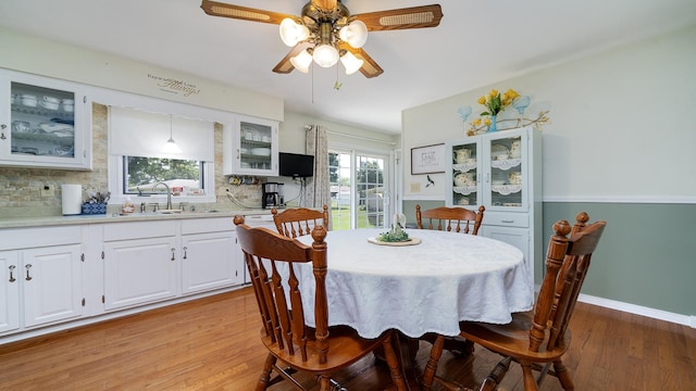 9833 Gentian Dr, Machesney Park, IL 61115 - dining area featuring light wood-type flooring and a ceiling fan