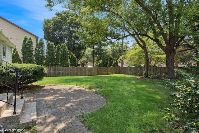 3513 Woodland Cir, Island Lake, IL 60042 - fenced backyard featuring a patio area