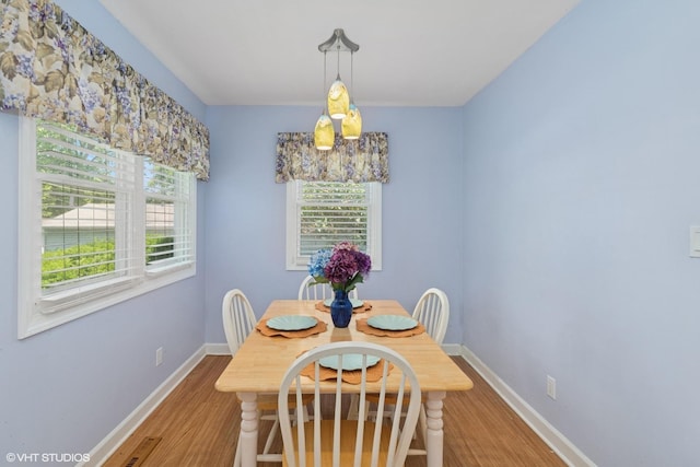 3513 Woodland Cir, Island Lake, IL 60042 - dining space featuring wood finished floors and baseboards
