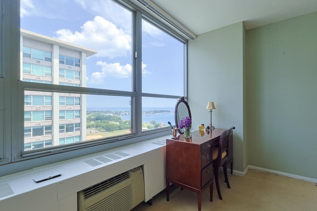 3550 N Lake Shore Dr Unit 2616, Chicago, IL 60657 - home office featuring light colored carpet, a water view, and an AC wall unit