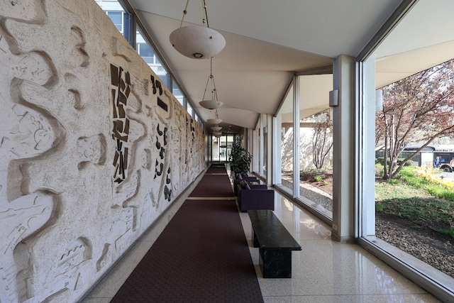 3550 N Lake Shore Dr Unit 2616, Chicago, IL 60657 - corridor featuring expansive windows, healthy amount of natural light, and high vaulted ceiling