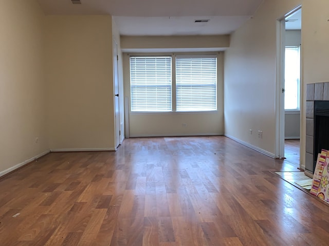 1235 Wyndham Ct Unit 202, Palatine, IL 60074 - empty room with wood finished floors