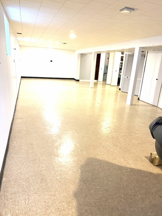6023 W 64th St, Chicago, IL 60638 - finished below grade area featuring tile patterned floors and baseboards