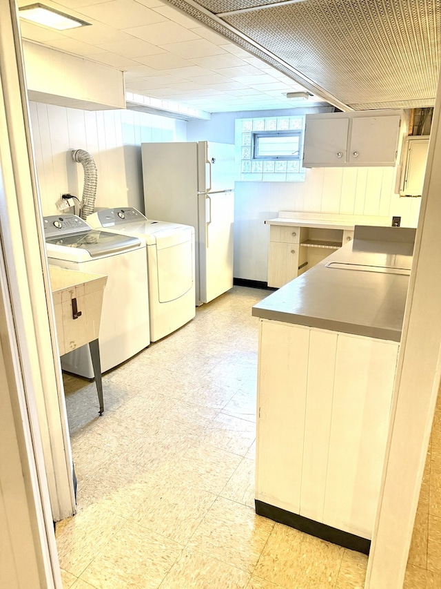 6023 W 64th St, Chicago, IL 60638 - laundry area with light flooring, independent washer and dryer, and cabinet space
