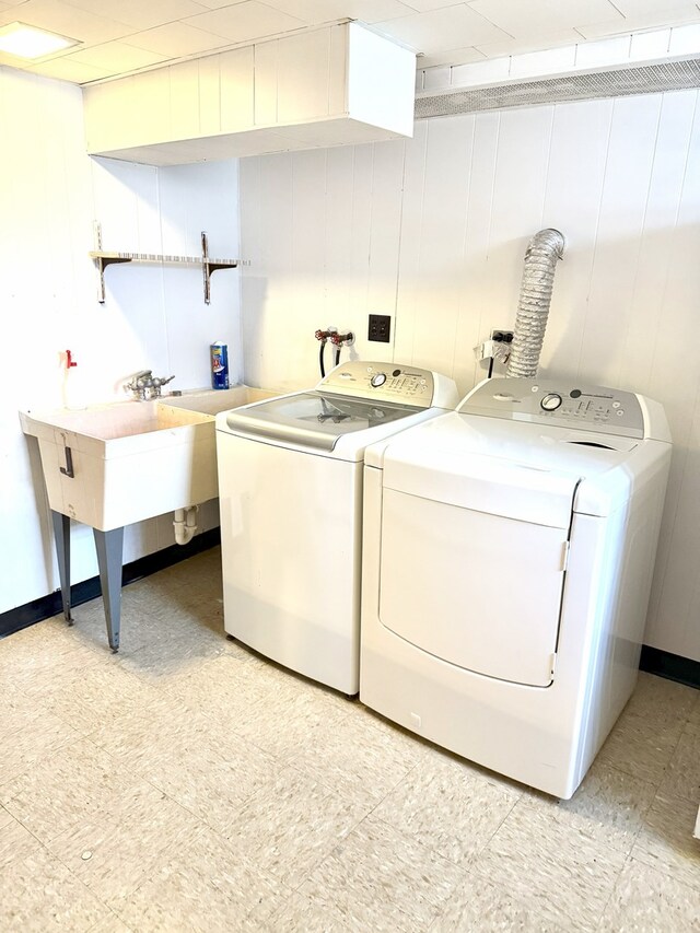 6023 W 64th St, Chicago, IL 60638 - washroom with washing machine and dryer and light flooring