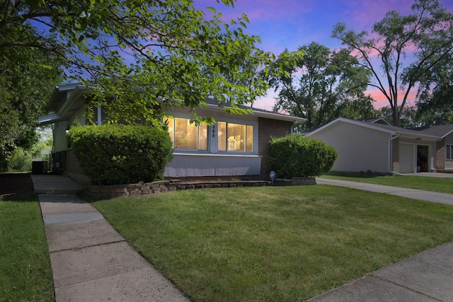 246 Gentry St, Park Forest, IL 60466 - view of front of house featuring a lawn and brick siding