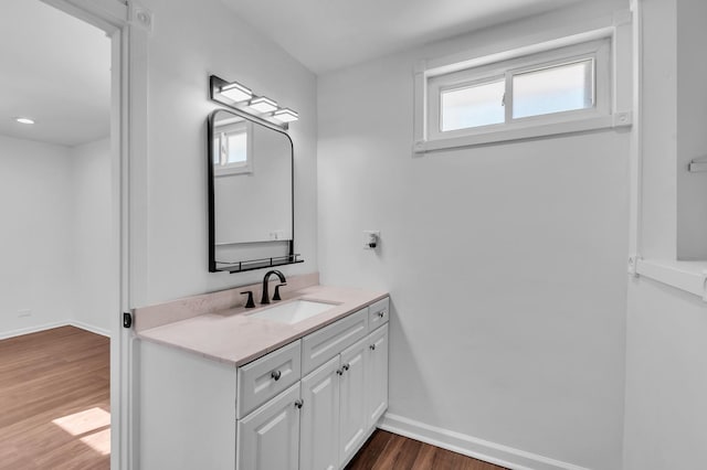 246 Gentry St, Park Forest, IL 60466 - bathroom with wood finished floors, plenty of natural light, and vanity