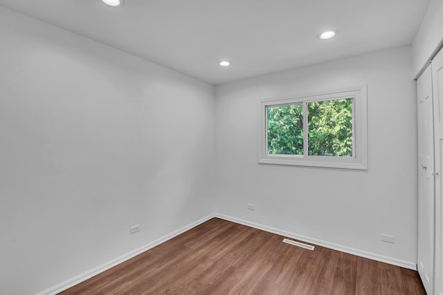 246 Gentry St, Park Forest, IL 60466 - spare room featuring wood finished floors and recessed lighting