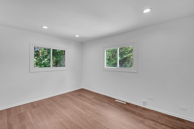 246 Gentry St, Park Forest, IL 60466 - spare room featuring wood finished floors and recessed lighting