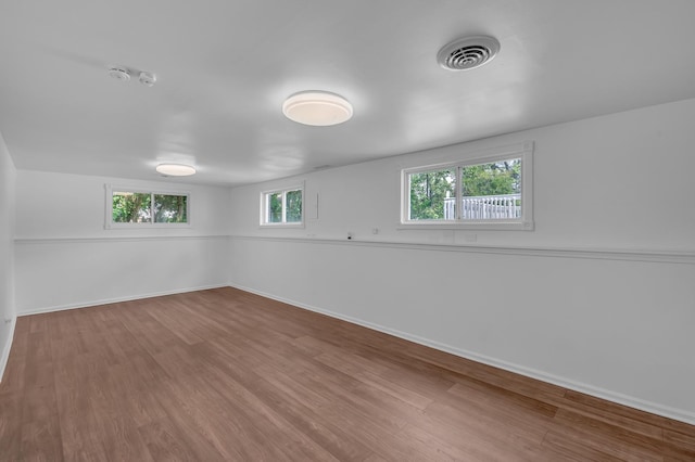 246 Gentry St, Park Forest, IL 60466 - empty room with wood finished floors and a smoke detector