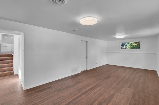 246 Gentry St, Park Forest, IL 60466 - spare room with dark wood finished floors and stairway
