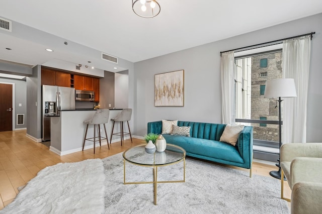 130 N Garland Ct Unit 1608, Chicago, IL 60602 - living area featuring light wood finished floors and recessed lighting
