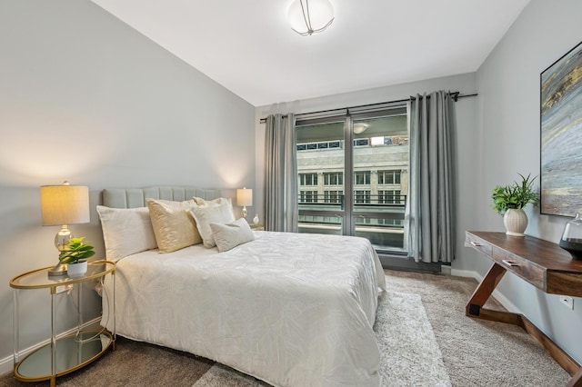 130 N Garland Ct Unit 1608, Chicago, IL 60602 - carpeted bedroom featuring baseboards and vaulted ceiling