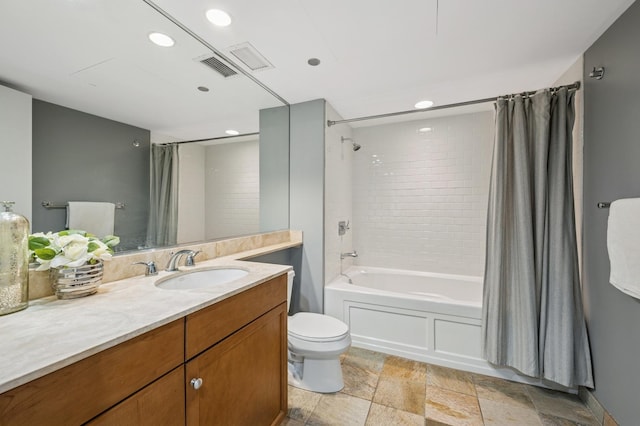 130 N Garland Ct Unit 1608, Chicago, IL 60602 - bathroom featuring vanity, recessed lighting, shower / bath combo with shower curtain, and stone finish floors