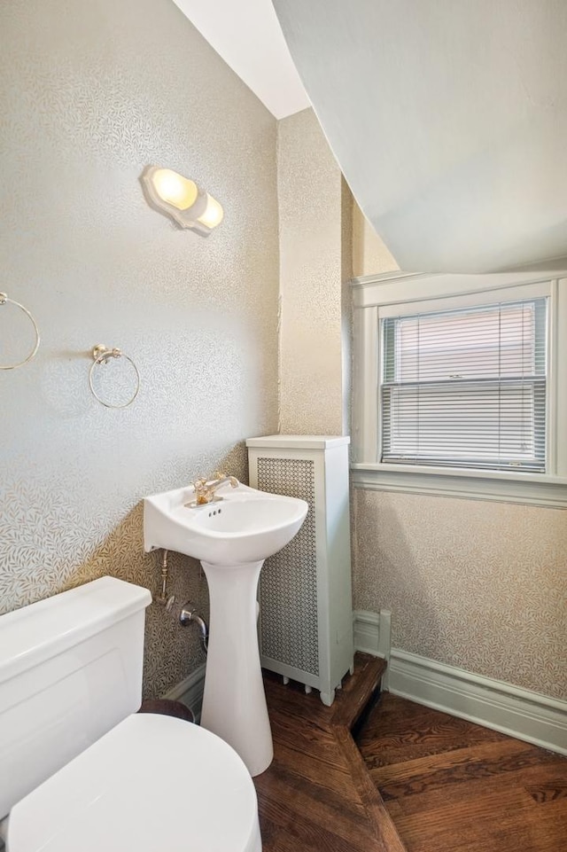 611 Lake Ave, Wilmette, IL 60091 - bathroom with wood finished floors, radiator, and a textured wall