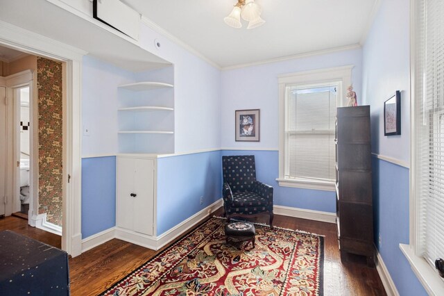 611 Lake Ave, Wilmette, IL 60091 - sitting room featuring wood finished floors, crown molding, and built in features