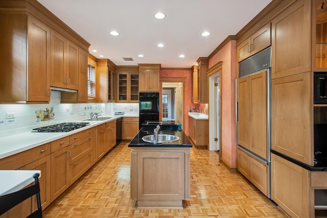 611 Lake Ave, Wilmette, IL 60091 - kitchen featuring black appliances, a kitchen island with sink, recessed lighting, backsplash, and under cabinet range hood